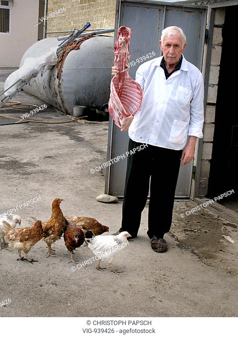 Azerbaijan, Sheki. Portrait of azerbaijan butscher. - Sheki, Azerbaijan, 16/05/2008