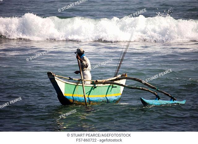 Fishermen in Outrigger fishing boats, Tangalle, Sri Lanka