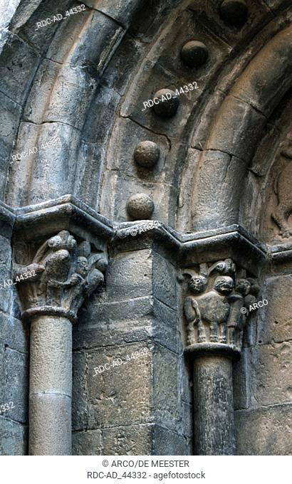 Detail of the entrance of roman church Santa Cruz de la Seros Spain