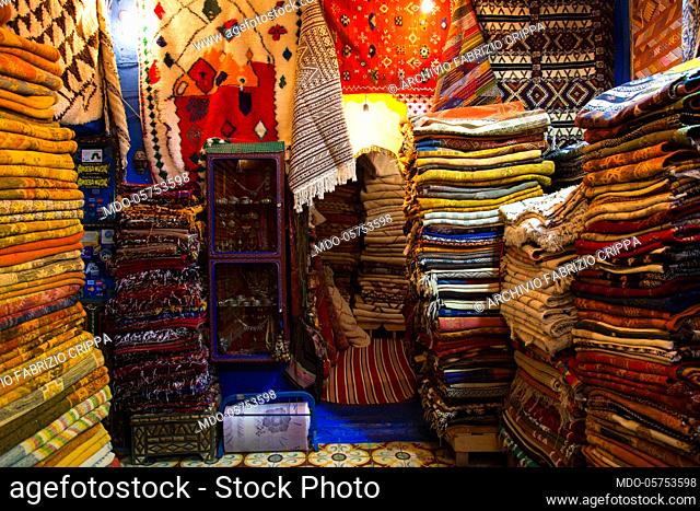 Different color and textures carpets in a Moroccan shop in Chefchaouen, April 2018