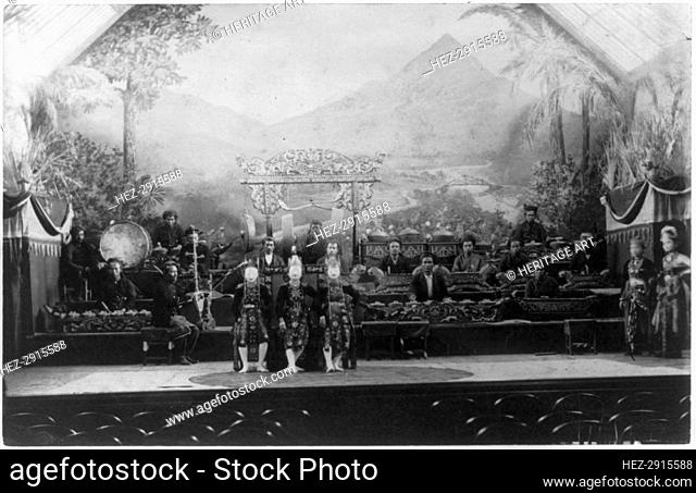 Javanese Gamelan Orchestra and Topeng masked dancers, World's Columbian Expo.., Chicago, 1891-1892. Creator: Frances Benjamin Johnston