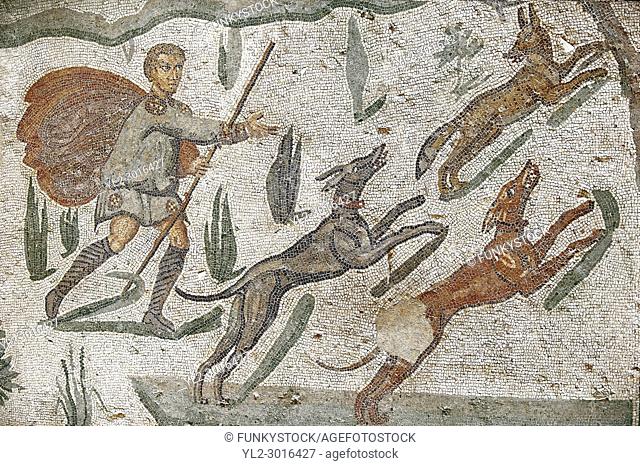 Hunter with dogs chasing a fox from the Room of The Small Hunt, no 25 - Roman mosaics at the Villa Romana del Casale 4th century AD. Sicily, Italy
