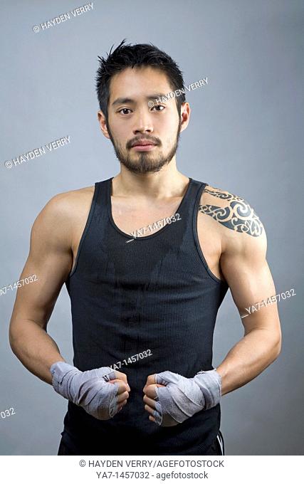 Chinese Kick Boxer with Tattoo