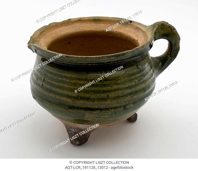 Pottery cooking jug, grape-model, glazed, yellow and green, bandoor, shaving on three legs, cooking jug be found in the earthenware ceramics earthenware glaze...