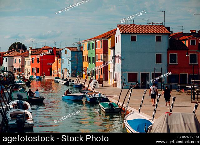 Burano, Italy - 7 August 2019: Tourists in Burano Island, Venice, Italy