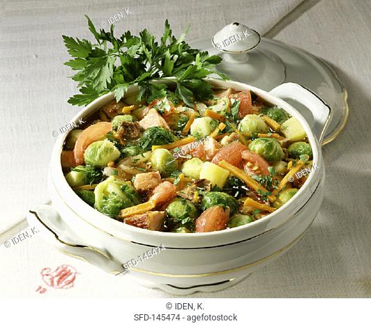 Brussels sprout & vegetable stew with smoked pork rib in tureen