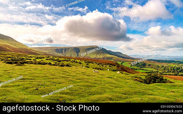View over the landscape of the Brecon Beacons National Park with Twmpa mountain on the left, seen from Hay Bluff car park in the Black Mountains, Powys, Wales