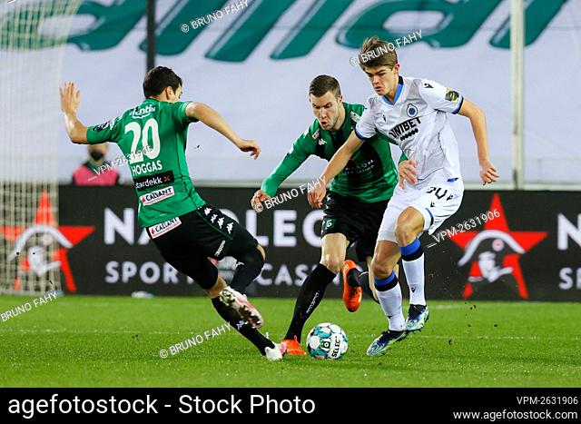 Cercle's Kevin Hoggas and Club's Charles De Ketelaere fight for the ball during a soccer match between Cercle Brugge and Club Brugge