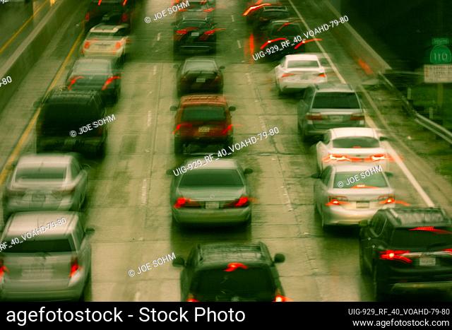 FEBRUARY 2, 2019 - LOS ANGELES, CA, USA - Abstract and impressionistic Traffic Congestion in a rain storm on the 110 CA Freeway
