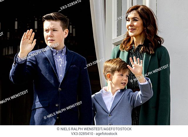 AARHUS - Queen Margrethe of Denmark, flanked by Crown Prince Frederik, Crown Princess Mary and their children Prince Christian