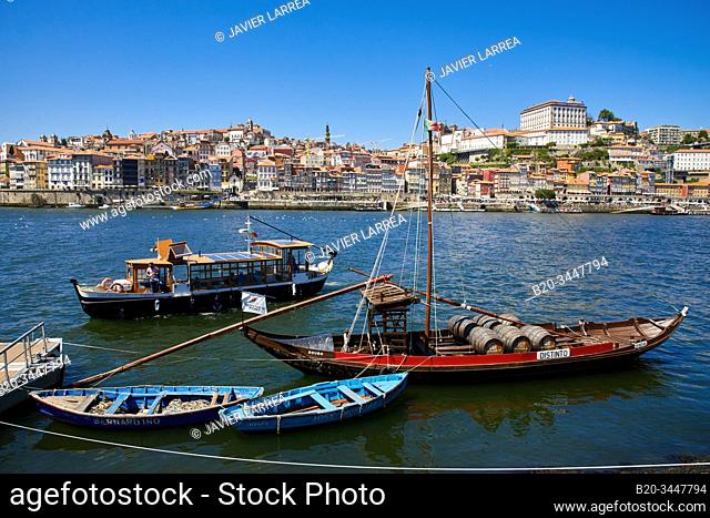 Traditional Portuguese wooden cargo boats transporting port wine, Rio Douro river, Vila Nova de Gaia, Porto, Portugal
