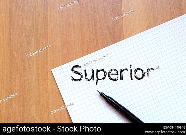 Superior text concept write on notebook