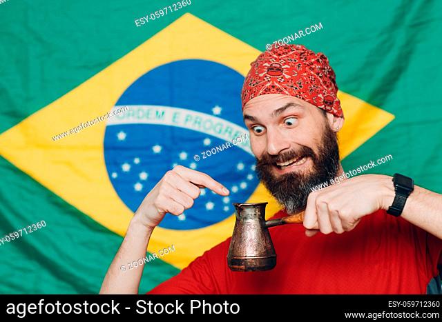 Bearded man in bandana against Brazilian flag background