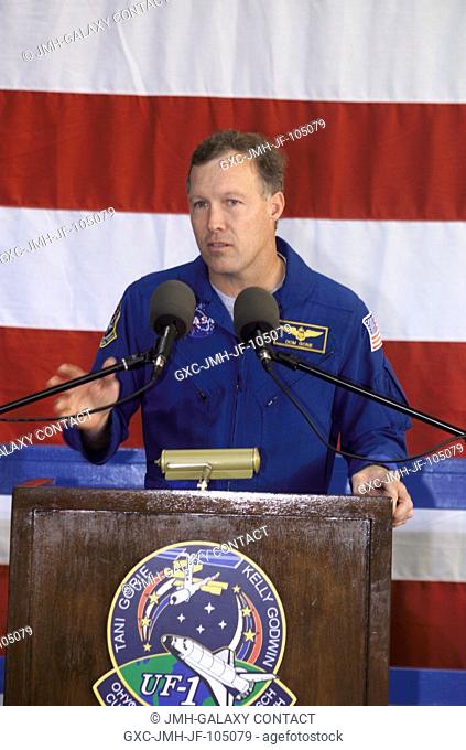 Astronaut Dominic L. Gorie, STS-108 mission commander, speaks from the podium in Hangar 990 at Ellington Field during the STS-108 and Expedition Three crew...