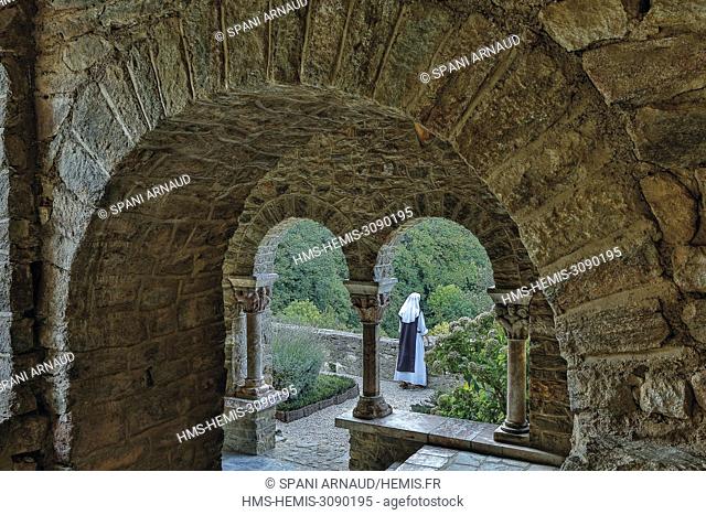 France, Pyrenees Orientales, Natural regional park Catalan Pyrenees, St Martin du Canigou abbey, nun on the terrace of the abbey