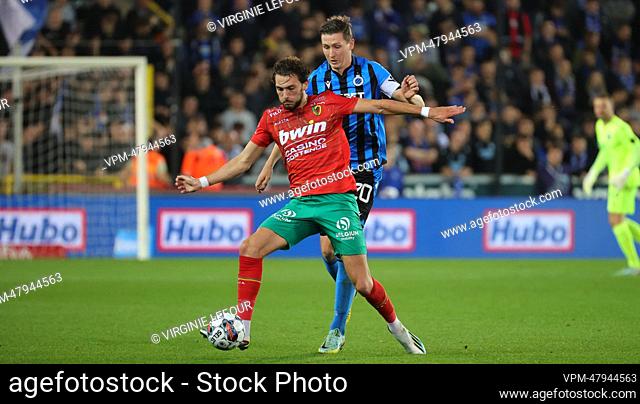 Oostende's Fraser Hornby and Club's Hans Vanaken fight for the ball during a soccer match between Club Brugge KV and KV Oostende