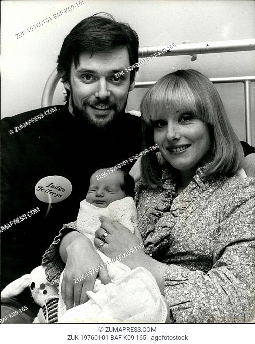 Jan. 01, 1976 - Star of 'Up stairs', Downstairs Simon Williams shows off his new baby daughter.: Actor Simon Williams, who played Major James Bellamy in the...