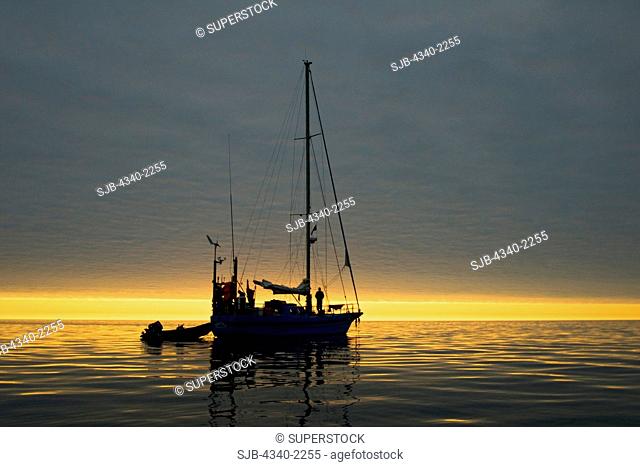 Photographers travel via a steel-hull sailboat to circumnavigate the Svalbard archipelago in summertime, Norway