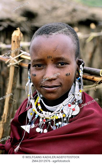 TANZANIA, NEAR NGORONGORO CRATER, MASAI VILLAGE, PORTRAIT OF WOMAN WITH TATTOOS