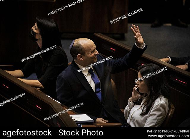 13 June 2021, Israel, Jerusalem: Naftali Bennett (C), who is set to become Israel's new Prime Minister, attends a session at the Israeli Parliament (Knesset)