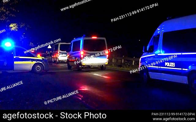 12 November 2023, Brandenburg, Vieritz: The video still shows police vehicles leaving the scene. After around 34 hours, a major police operation involving an...