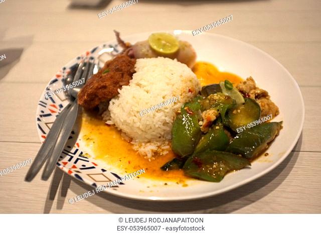 Rice and Spicy stir fry eggplant and minced pork in Rice and Curry Shop at Central Village outlet near Suvarnabhumi , Thailand