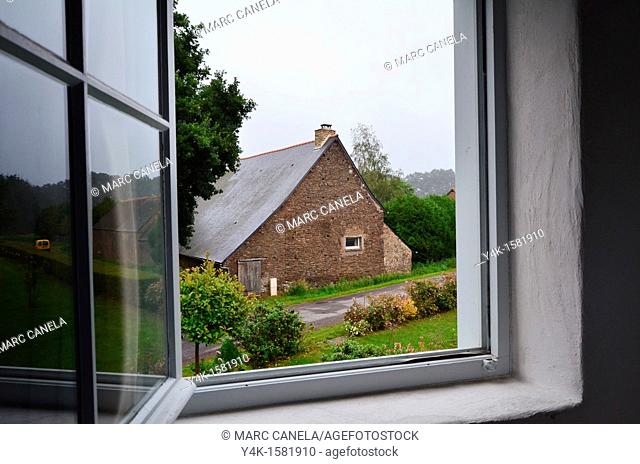 Europe, France, Bretagne, Brittany region, Boubansais, Pleugueneuc Village, Looking out the window