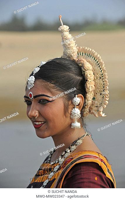 A dancer from Guru Gangadhar Pradhan's Konark Natya Mandap at the Konark beach, during the annual Konark Dance and Music Festival