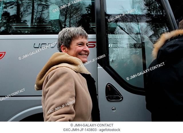 At the Gagarin Cosmonaut Training Center in Star City, Russia, Expedition 50-51 crew member Peggy Whitson of NASA flashes a smile before boarding a bus Nov