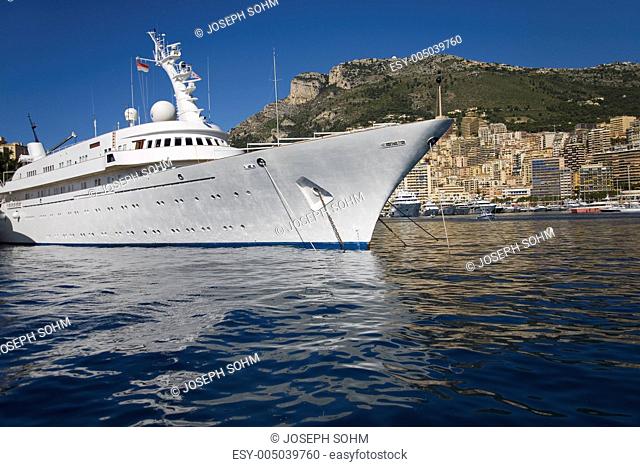 Yacht and seaside view of Monte-Carlo, the Principality of Monaco, Western Europe on the Mediterranean Sea