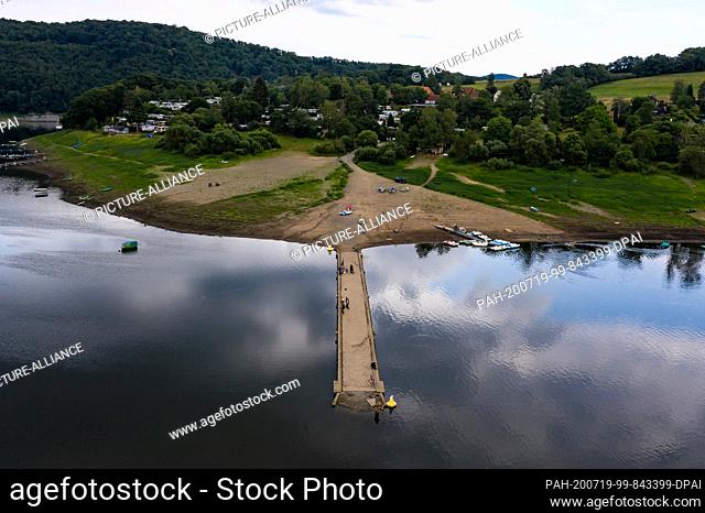 17 July 2020, Hessen, Edertal: Picture taken from the Aseler bridge in the Edersee. The water level of the North Hessian Edersee has dropped below the 50...