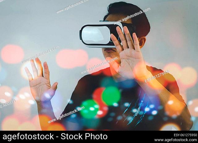 man metaverse using virtual reality headset virtual reality device, simulation, 3D, AR, VR technology concept