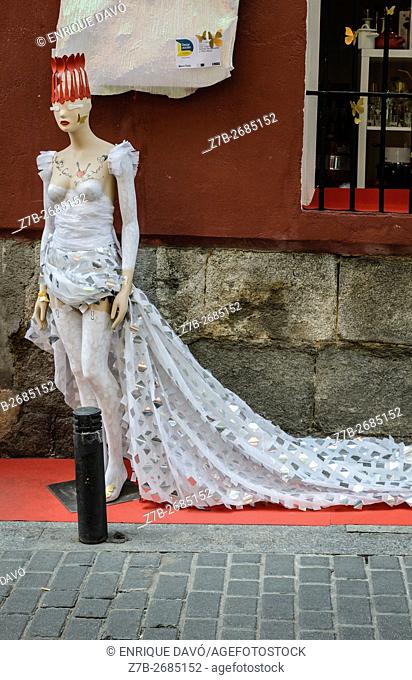 Madrid, Spain, 12 st June 2016. A wall street view with model in DecorAccion Market, Letters Quarter, Madrid, Spain