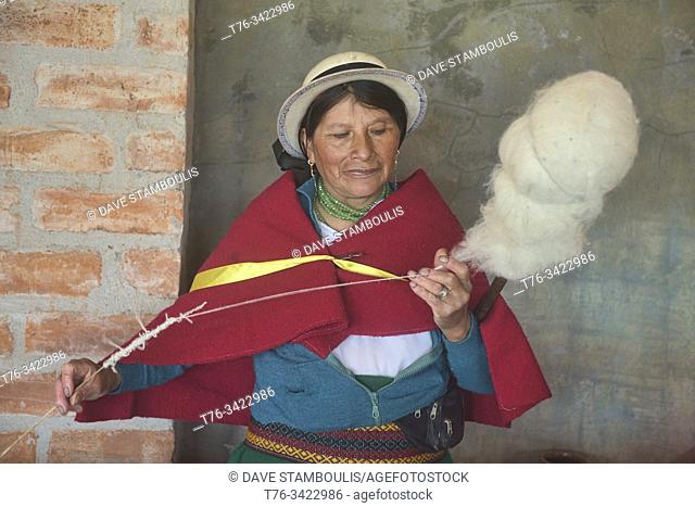 Indigenous highlander spinning wool, La Moya, Ecuador
