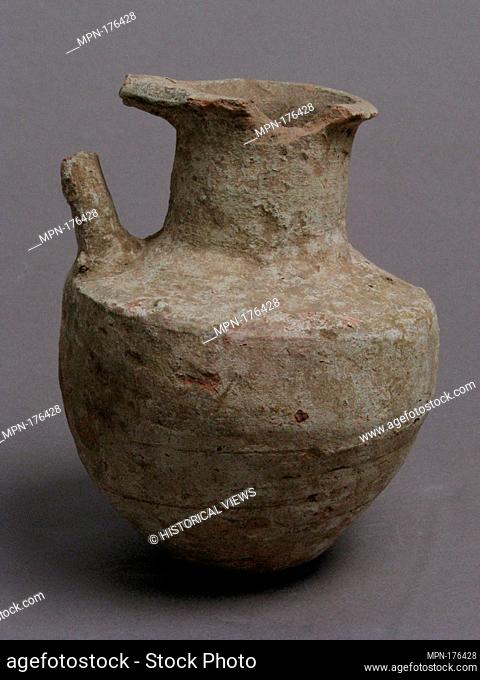 Jug. Date: 4th-7th century; Geography: Made in Kharga Oasis, Byzantine Egypt; Culture: Coptic; Medium: Earthenware; Dimensions: Overall: 4 13/16 x 3 13/16 in