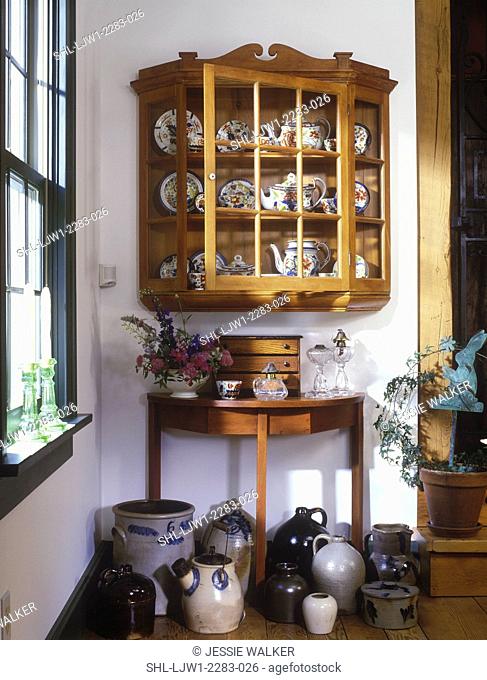 COLLECTION -Wall display cabinet with Gaudy Dutch china Stoneware jugs on floor, demi-lune table with glassoil lamps, period country, European