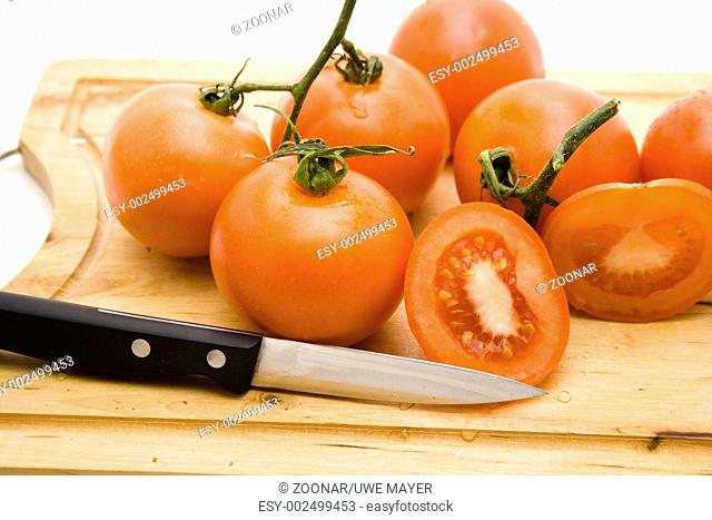 Tomatoes with knife