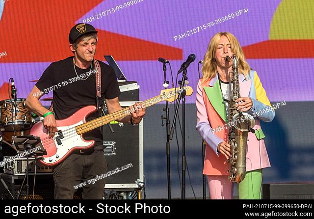 15 July 2021, Hamburg: The saxophonist Stephanie Lottermoser plays with her band on the stage of Spielbudenplatz for the opening of the Hamburg Summer of...