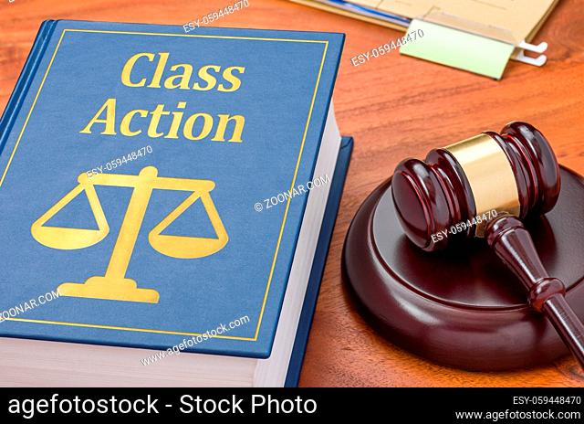 A law book with a gavel - Class action