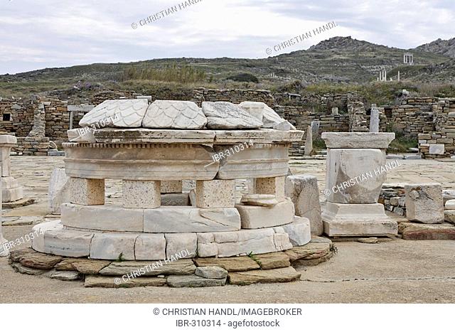 Round temple on square near the harbour called Agora of the Competaliasts, Delos, Greece