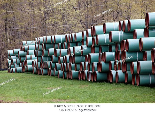 Many stacks of pipes for Tennessee pipeline in Marcellus Shale area