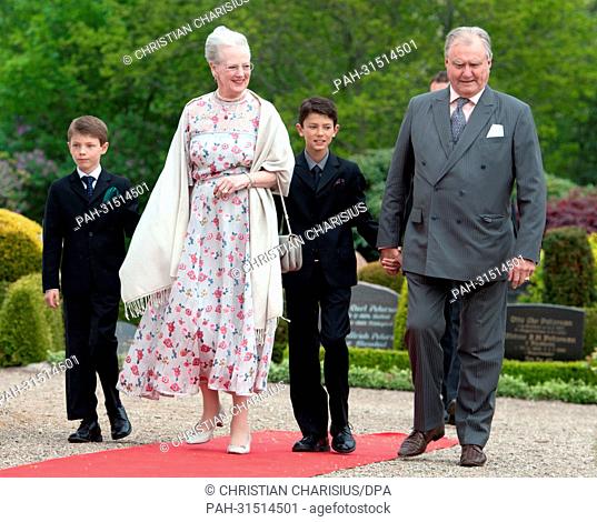 Danish Queen Margrethe with Prince Felix (l) and Prince Consort Henrik with Prince Nikolai (r), the sons of Prince Joachim