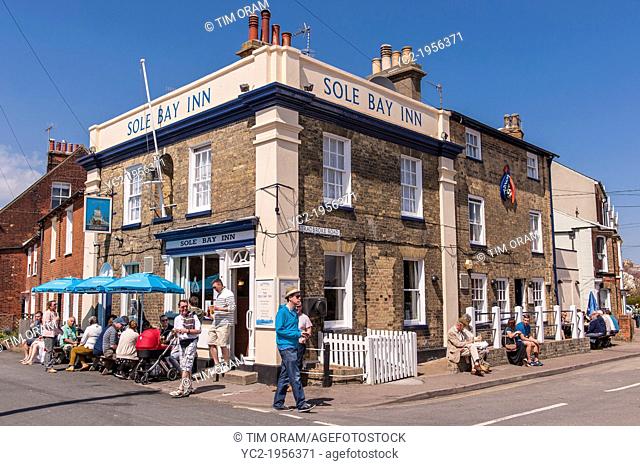 Southwold, Suffolk, UK. 6th May 2013. People enjoy the sunny weather on Bank Holiday Monday 6th of May 2013 while drinking in the Sole Bay Inn pub at Southwold