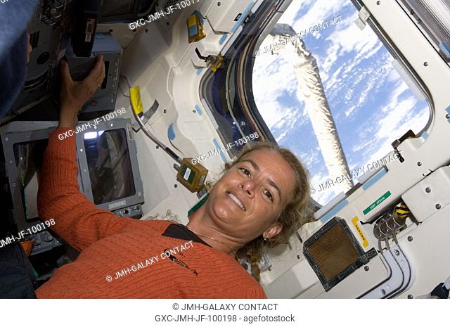 Canadian Space Agency astronaut Julie Payette, STS-127 mission specialist, is pictured on the aft flight deck of Space Shuttle Endeavour during flight day two...