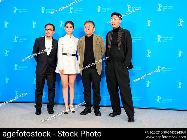 18 February 2023, Berlin: Actors Wang Hongwei (l-r), Huang Yao, director Zhang Lu and Xin Baiqing stand next to each other during the photocall for director...