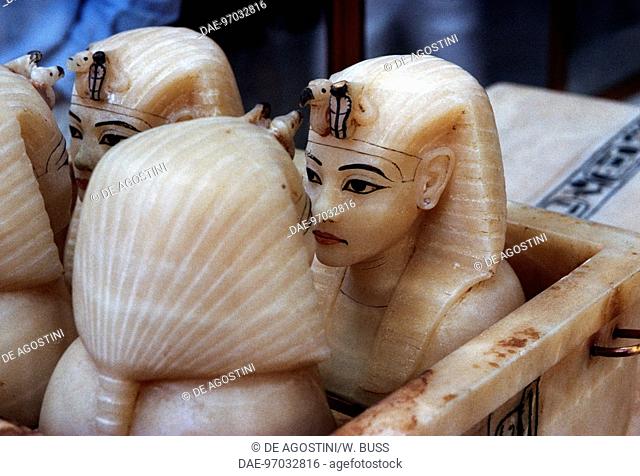 Painted canopic jars in alabaster, from the Treasury of Tutankhamen, 1333-1323 BC. Egyptian civilisation, Dynasty XVIII.  Cairo, Egyptian Museum