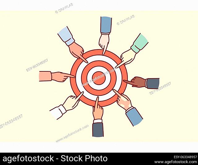 Hands of diverse people near target for concept of collaboration for solving joint task and teamwork in business. Achieving set goals to gain strategic...