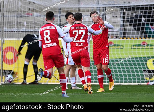 goaljubel after the 1-0: Baptiste Santamaria (SC Freiburg), Roland Sallai (SC Freiburg) and goalschuetze Ermedin Demirovic (SC Freiburg)