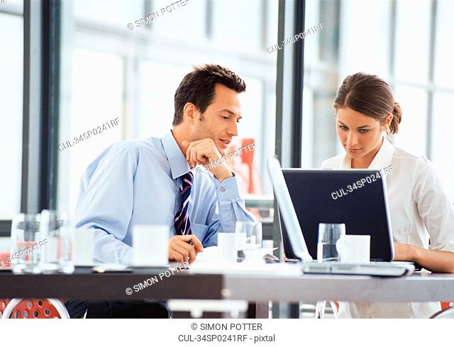 Business people working at desk