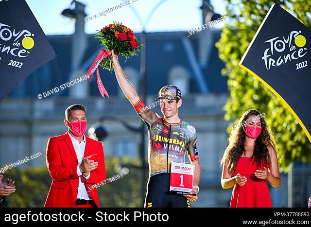 Belgian Wout Van Aert of Team Jumbo-Visma celebrates on the podium after stage 21, the final stage of the Tour de France cycling race
